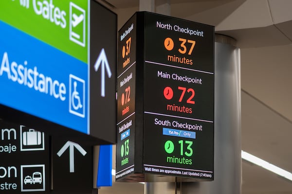 Wait times displayed at Hartsfield-Jackson Atlanta International Airport amid the ongoing partial goverment shutdown.  Wednesday, March 18, 2026 (Ben Hendren for the AJC)