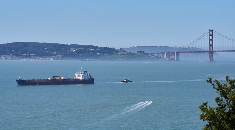 A tanker and other vessels pass through the San Francisco Bay, Tuesday, May 19, 2026. (AP Photo/Annika Hammerschlag)