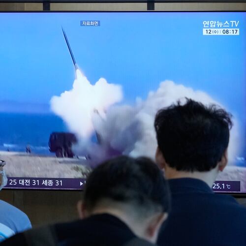 A TV screen shows a file image of North Korea's missile launch during a news program at Seoul Railway Station in Seoul, South Korea, Wednesday, Aug. 12, 2026. (AP Photo/Ahn Young-joon)