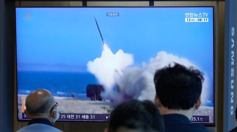 A TV screen shows a file image of North Korea's missile launch during a news program at Seoul Railway Station in Seoul, South Korea, Wednesday, Aug. 12, 2026. (AP Photo/Ahn Young-joon)