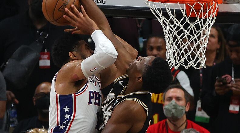 Onyeka Okongwu #17 of the Atlanta Hawks blocks a dunk attempt by Tobias Harris #12 of the Philadelphia 76ers during the second half of game 6 of the Eastern Conference Semifinals at State Farm Arena on June 18, 2021 in Atlanta, Georgia. (Kevin C. Cox/Getty Images/TNS)
