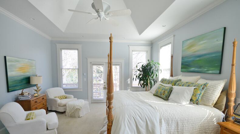 The pine rice-carved bed in the master bedroom was a gift Ann Roland purchased for herself after graduating from Texas Christian University.