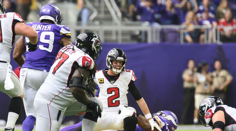 Matt Ryan #2 of the Atlanta Falcons is sacked with the ball by Everson Griffen #97 of the Minnesota Vikings in the fourth quarter oat U.S. Bank Stadium on September 8, 2019 in Minneapolis