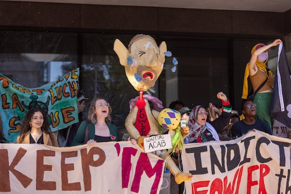 Activists against Atlanta’s Public Safety Training Center held a press conference outside the Fulton County Courthouse following a hearing in the training center case on Wednesday, September 10, 2025. (Arvin Temkar/AJC)