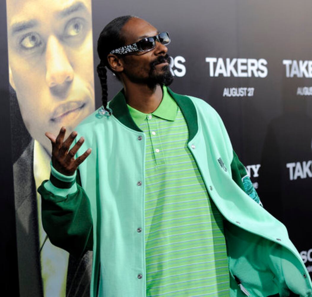 T.I., other stars, shine at 'Takers' film premiere