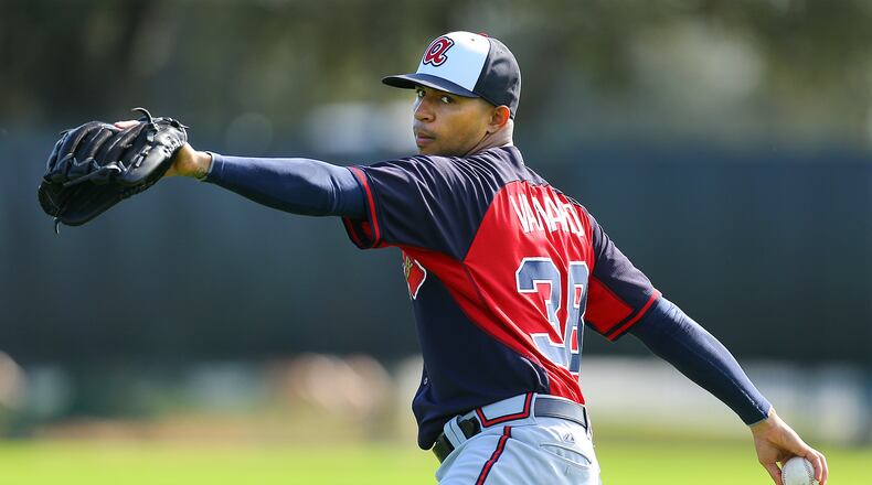Anthony Varvaro throws in the field to losen up before pitching at spring training on Thursday, Feb. 20, 2014, in Lake Buena Vista, FL.