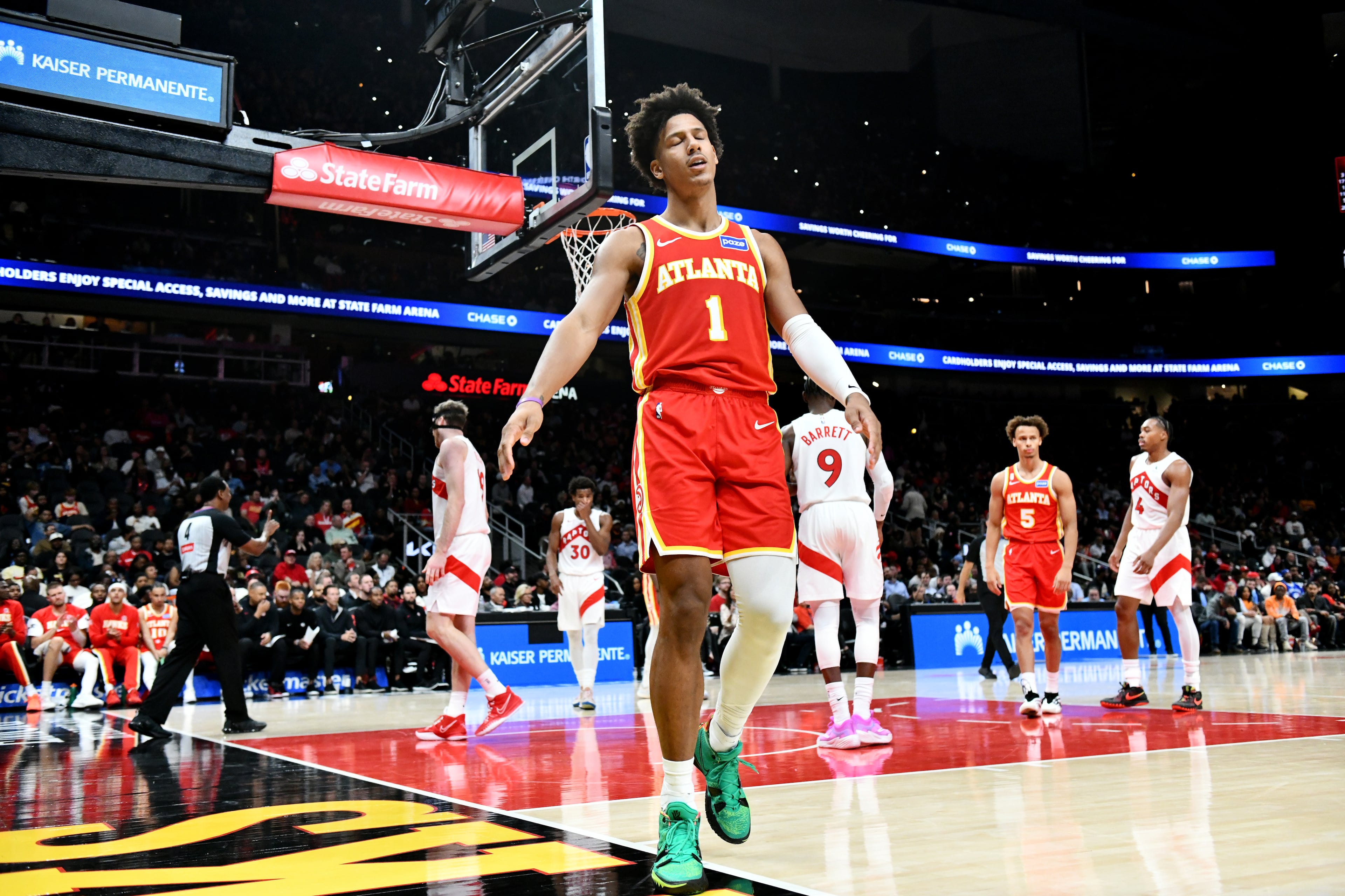 Atlanta Hawks forward Jalen Johnson (1) reacts during the second half in the home opener at State Farm Arena, Thursday, October 22, 2025, in Atlanta. Toronto Raptors won 138-118 over Atlanta Hawks. (Hyosub Shin / AJC)