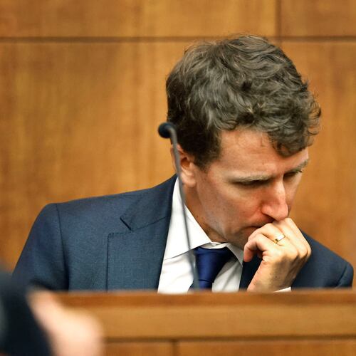 Patrick Clancy reacts as images of himself and his children on vacation a month before they were killed is shown in the courtroom at Plymouth Superior Court in Plymouth, Mass., Monday, July 27, 2026. (Greg Derr/The Patriot Ledger via AP, Pool)