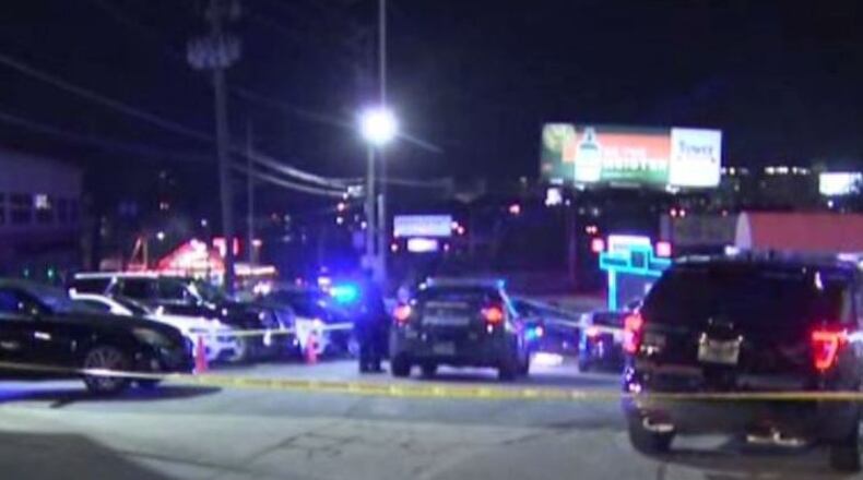 A man is in critical condition after he was shot outside a Midtown Atlanta strip club.