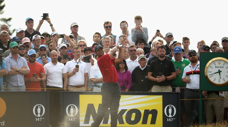Tiger Woods draws a crowd at Carnoustie, just as he would at East Lake should he make the Tour Championship field. (Francois Nel/Getty Images)