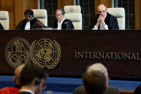 Presiding judge Yuji Iwasawa opens the International Court of Justice hearings into a United Nations request for an advisory opinion on Israel's obligations to allow humanitarian assistance in Gaza and the West Bank, in The Hague, Netherlands, Monday, April 28, 2025. (AP Photo/Peter Dejong)