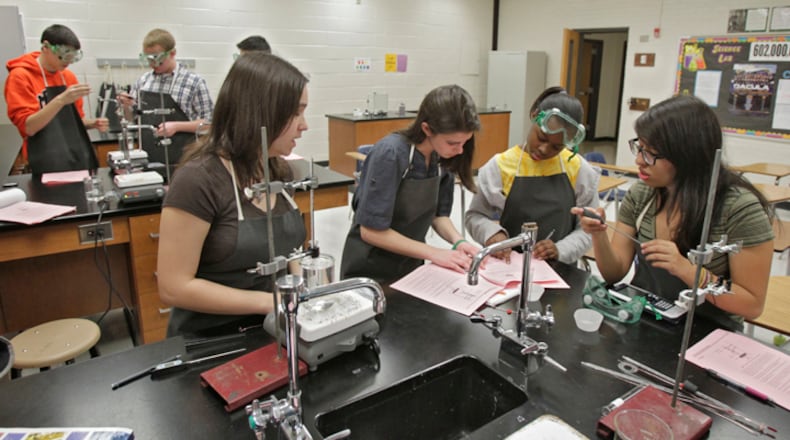 Students work together on their chemistry project in a Dacula High School AP chemistry class. (Bob Andres / AJC file photo)
