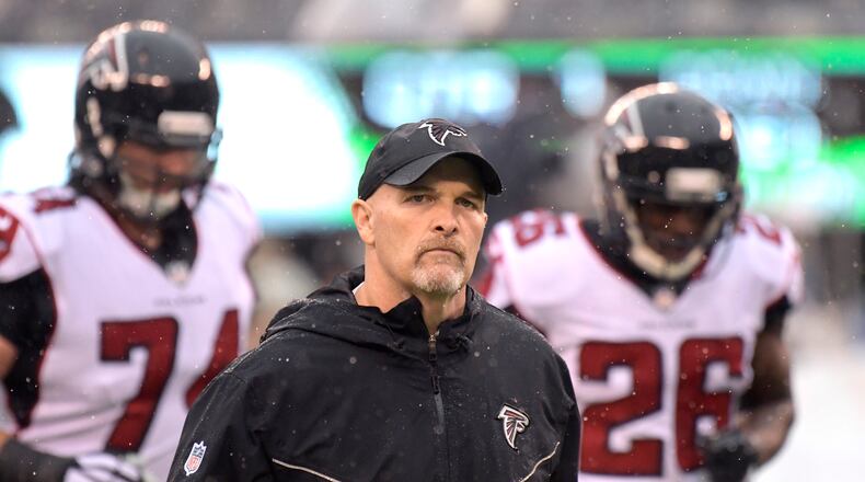Atlanta Falcons head coach Dan Quinn clocks in for one of the good days at work this season - against the Jets Sunday in New York. (AP Photo/Bill Kostroun)