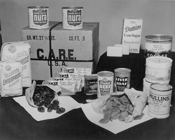 Contents of a typical CARE package. German civilians called the planes dropping the boxes “raisin bombers.” (Courtesy of CARE)