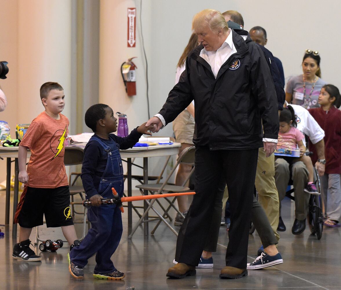Photos: President Trump, first lady visit with Harvey victims