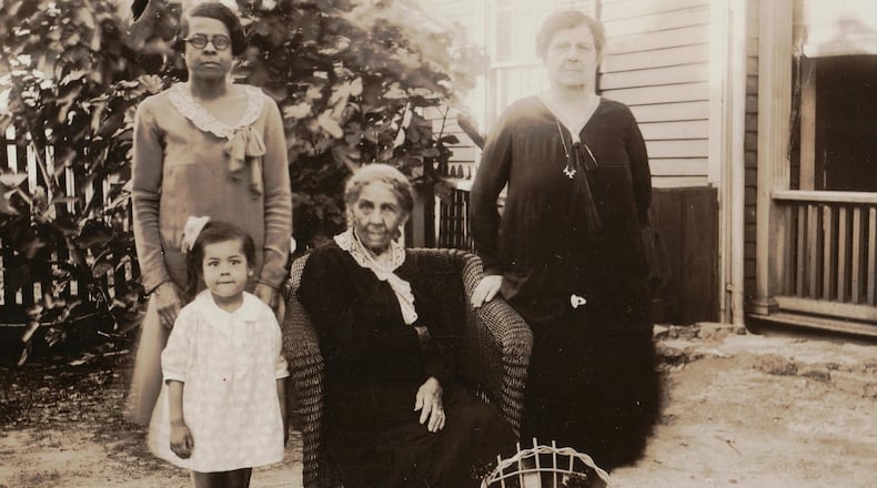 Sallie Durham (seated) was the matriarch of an influential Decatur family. She is seen here with her daughter, Clara Maxwell Pitts (right), her granddaughter Mae Maxwell Yates (left) and her great-granddaughter Clara Yates Hayley. CONTRIBUTED BY CLARA AXAM