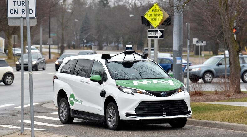 The May Mobility Ann Arbor wheelchair assessable, Toyota Sienna autonomous vehicle prepares to stop for a pickup on Henry near in Ann Arbor, Michigan, on Jan. 5, 2023. (Todd McInturf/The Detroit News/TNS)