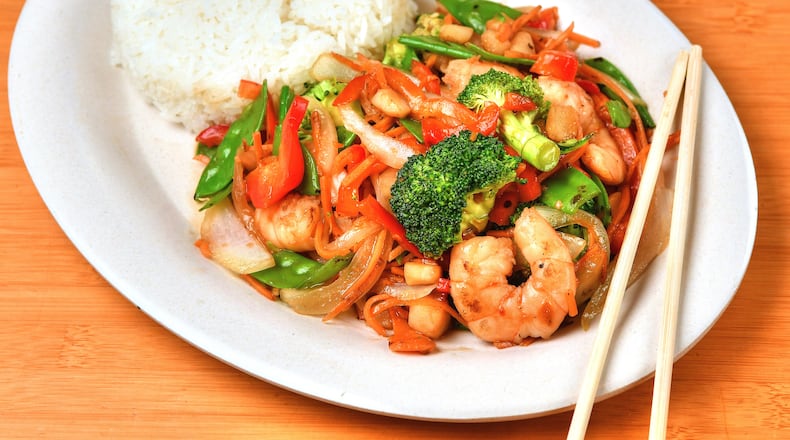 Spicy Szechuan Stir Fry with Shrimp, from Doc Chey's. You can make the recipe with your choice of protein. (Chris Hunt for The Atlanta Journal-Constitution)