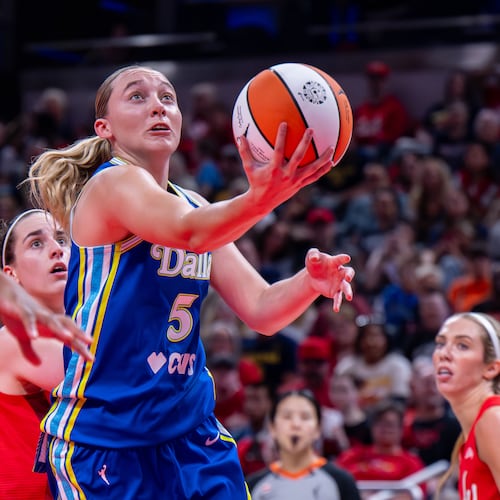 Dallas Wings guard Paige Bueckers (5) looks to shoot during the first half of an WNBA basketball game against the Indiana Fever in Indianapolis, Saturday, May 9, 2026. (AP Photo/Doug McSchooler)