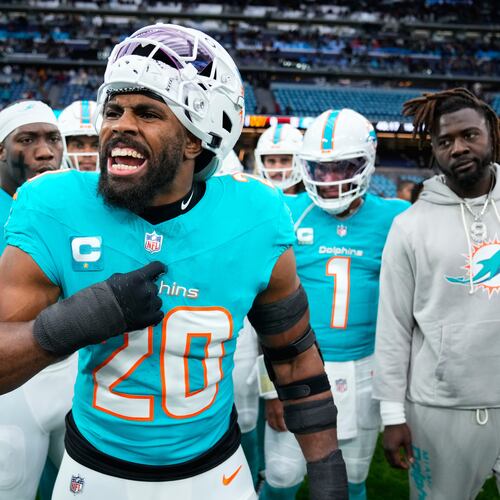 FILE - Miami Dolphins linebacker Jordyn Brooks (20) reacts as he warms-up before an NFL football game between the Washington Commanders and the Miami Dolphins in Madrid, Spain, Nov. 16, 2025. (AP Photo/Manu Fernandez, File)