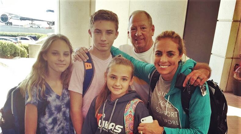 The Collens' family on the road, from left, daughter Reese, son Connor, Tom and Nicki, daughter Logan, center. (Photo courtesy Collen family).