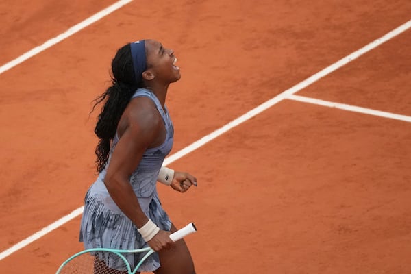 Coco Gauff of the U.S. celebrates as she won the final match of the French Tennis Open against Aryna Sabalenka of Belarus at the Roland-Garros stadium in Paris, Saturday, June 7, 2025. (AP Photo/Christophe Ena)