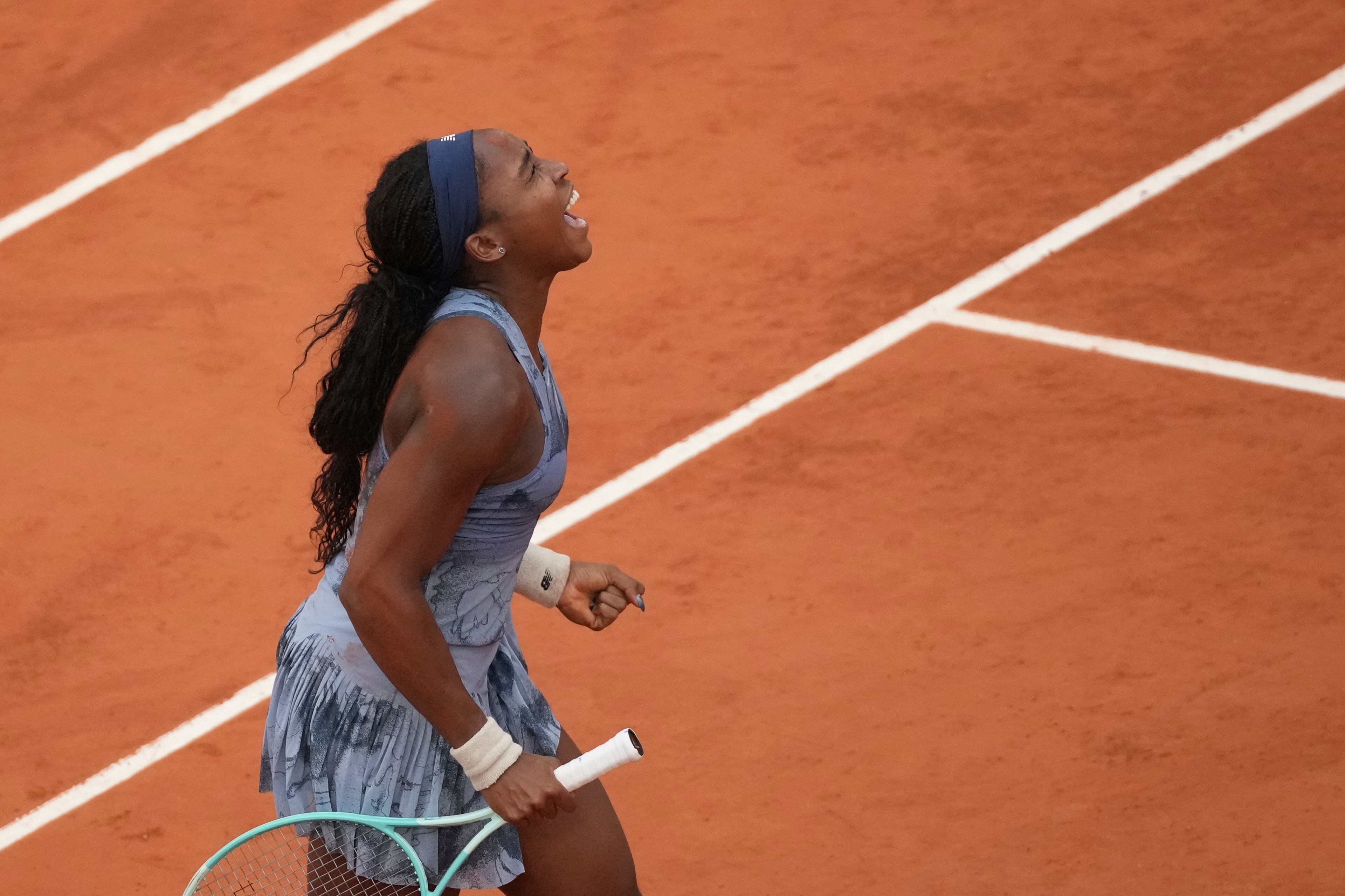 Coco Gauff of the U.S. celebrates as she won the final match of the French Tennis Open against Aryna Sabalenka of Belarus at the Roland-Garros stadium in Paris, Saturday, June 7, 2025. (AP Photo/Christophe Ena)