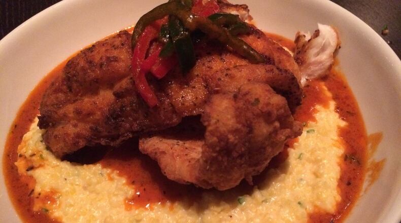 Grouper & Grits at Simon’s Restaurant is a rich mess of fish in a puddle of rich cheesy grits. CONTRIBUTED BY WENDELL BROCK