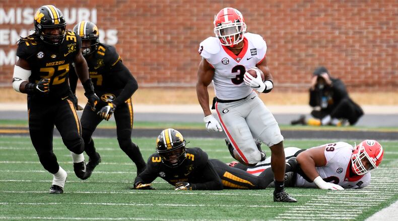 Georgia running back Zamir White (3) runs with the ball during the first half against Missouri Saturday, Dec. 12, 2020, in Columbia, Mo. (L.G. Patterson/AP)