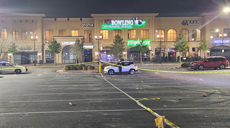 Police are investigating a fatal shooting early Saturday in the parking lot of the Paragon Town Center in Gwinnett County.