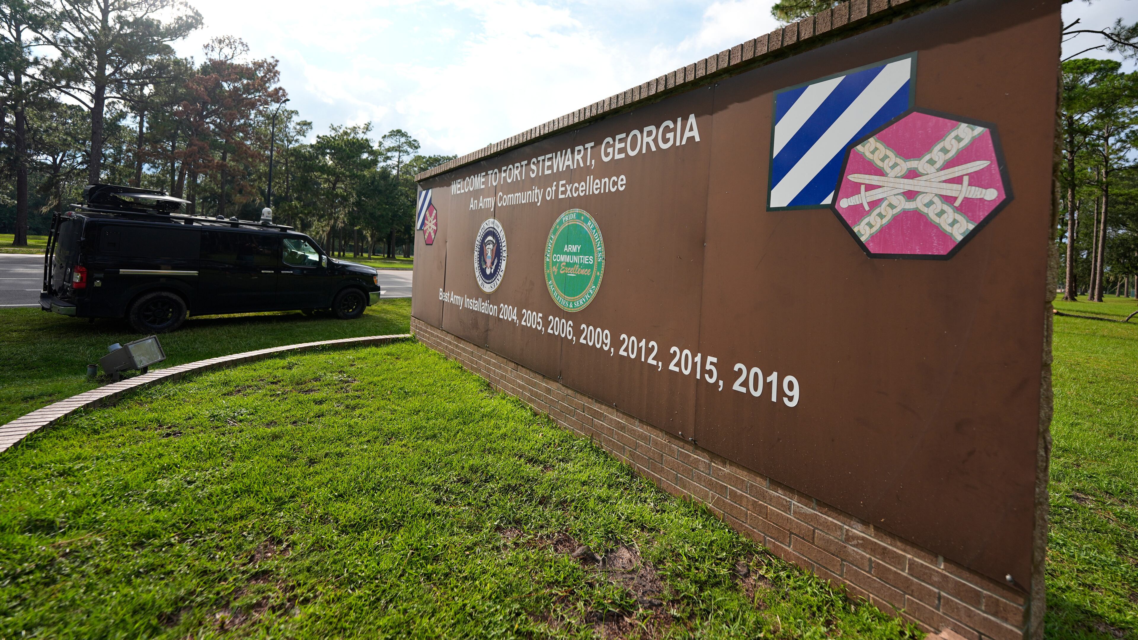 FILE - A sign welcoming people to Fort Stewart in Georgia is seen on Wednesday, Aug. 6, 2025. (AP Photo/Mike Stewart, File)