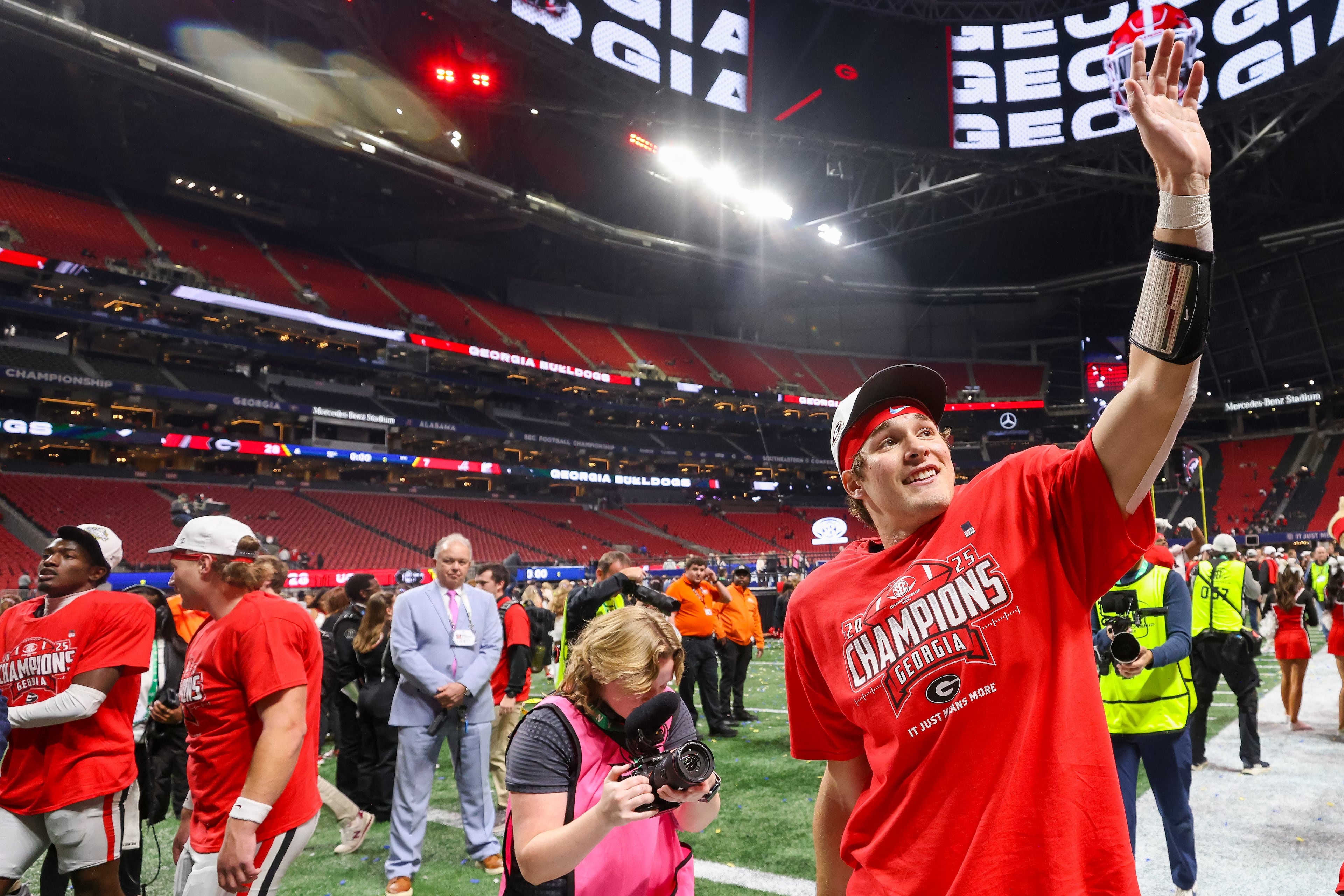 Georgia celebrates a 28-7 victory over Alabama in the SEC Championship game at Mercedes-Benz Stadium, Saturday, Dec. 6, 2025, in Atlanta. (Jason Getz / AJC)
