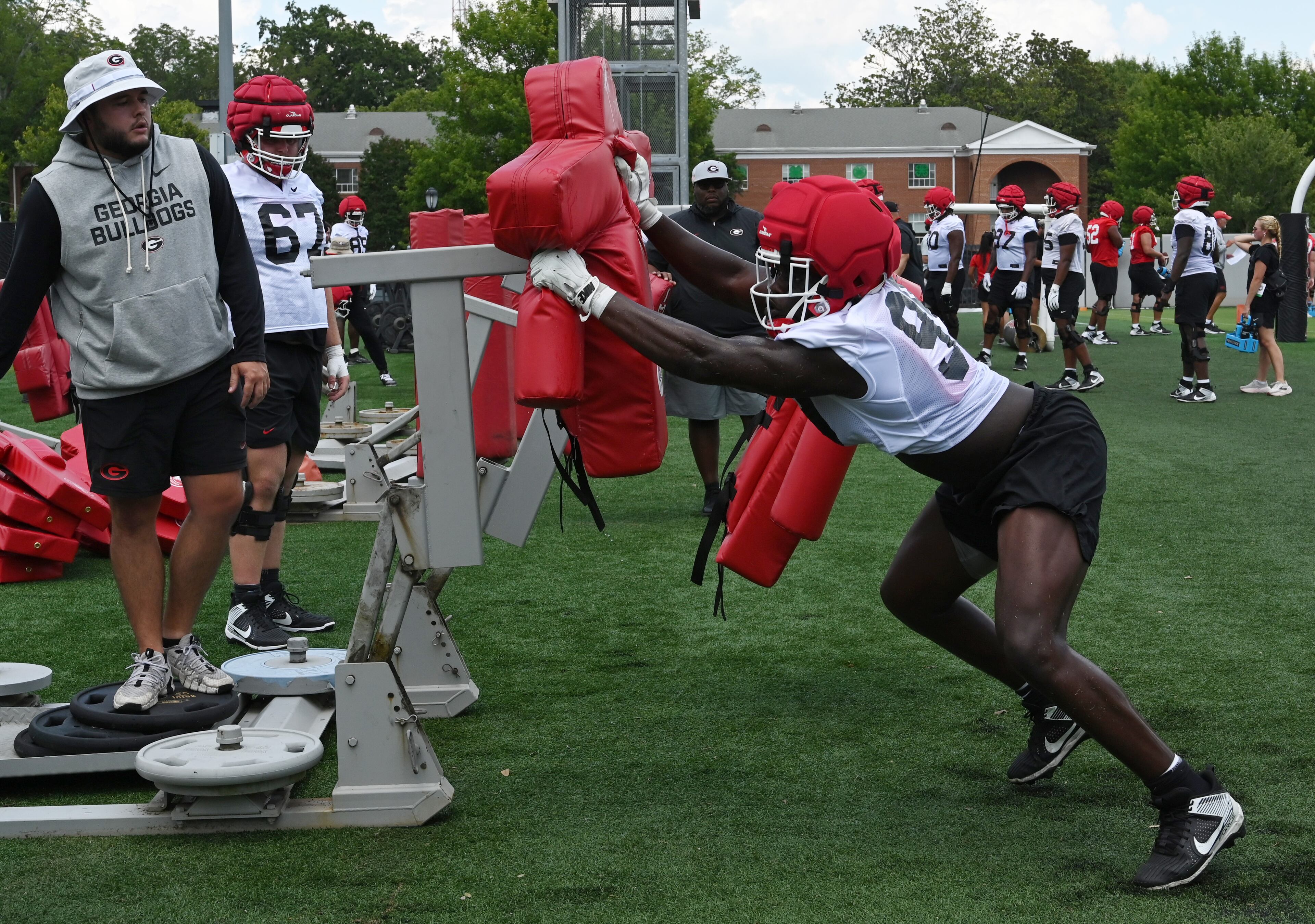 Georgia defensive lineman Joseph Jonah-Ajonye (99) runs a drill during a football practice at the University of Georgia practice facility, Thursday, July 31, 2025, in Athens. (Hyosub Shin / AJC)