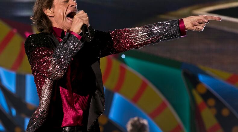 Mick Jagger performs during a Rolling Stones concert in Havana, Cuba, Friday March 25, 2016. The Rolling Stones unleashed two hours of rock and roll on an crowd of hundreds of thousands of Cubans and foreign visitors Friday March 25, 2016, capping one of the most momentous weeks in modern Cuban history with a massive celebration of music that was once forbidden here.(AP Photo/Enric Marti)