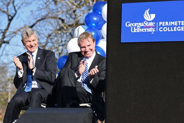  Mark Becker (left), President of Georgia State University, and Peter Lyons, Dean of Perimeter College, react during an unveiling ceremony at Georgia State University Clarkston Campus on Wednesday, January 13, 2016. 29. 