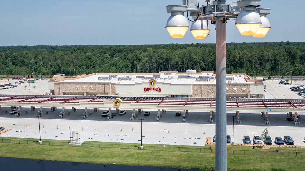 High-mast lights stand at I-95's Exit 42, the location of the new Buc-ee’s in Brunswick, on June 25, 2025. Buc-ee's has refused to comment on the lights, leading some critics to suspect the company is the reason for Glynn County's lack of action on the matter. (Justin Taylor/The Current GA/CatchLight Local)