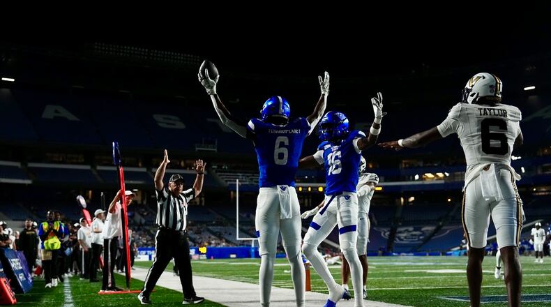 Georgia State's Rykem Laney (6) celebrates his touchdown reception with teammate Ted Hurst (16) on Sept. 14, 2024, against Vanderbilt at Center Parc Stadium.