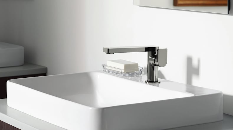 Minimalist faucets can incorporate beautifully understated contemporary designs centered around just the basic faucet elements, the handle and the spout. (Kohler)