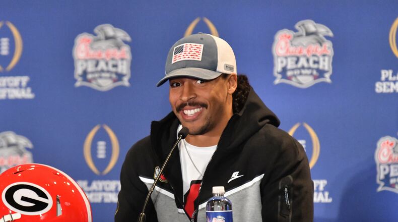 Ohio State linebacker Steele Chambers smiles as he answers a question during a news conference Wednesday in Atlanta. Chambers graduated from Blessed Trinity High School in Roswell. (Hyosub Shin / Hyosub.Shin@ajc.com)