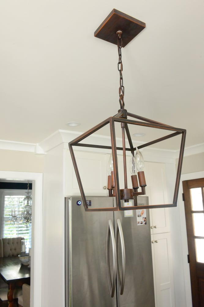 Photos: Tree crashing on kitchen spurs midcentury update in Collier Hills
