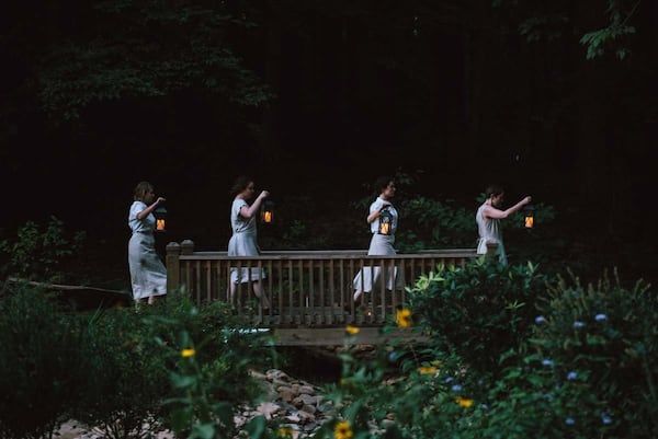 “Beulah Creek,” a production by Found Stages, was staged outdoors, beside a creek, in the Dunwoody Nature Center. Audience members sat on blankets and were given candles to help illuminate the setting. CONTRIBUTED BY FOUND STAGES