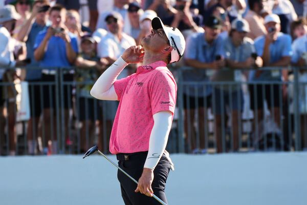 Max Greyserman reacts to missing a putt during a playoff during the final round of the Rocket Classic golf tournament at the Detroit Golf Club, Sunday, June 29, 2025, in Detroit. (AP Photo/Paul Sancya)