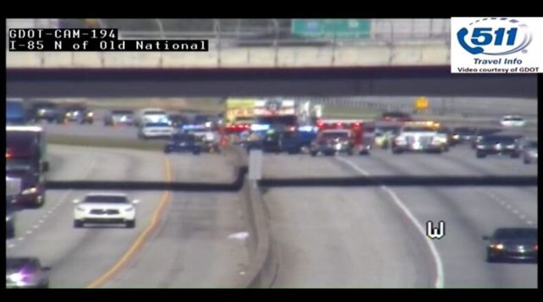 A College Park police officer was injured Monday morning when his patrol car was hit by a driver who fell asleep driving, according to investigators.