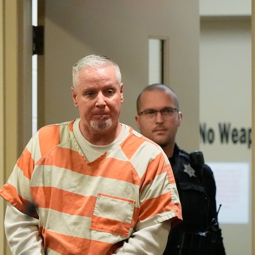 FILE - Colin Gray, the father of Apalachee High School shooting suspect Colt Gray, arrives to the courtroom at the Barrow County courthouse on Thursday, Dec. 18, 2025, in Winder,Ga. (AP Photo/Brynn Anderson, File)