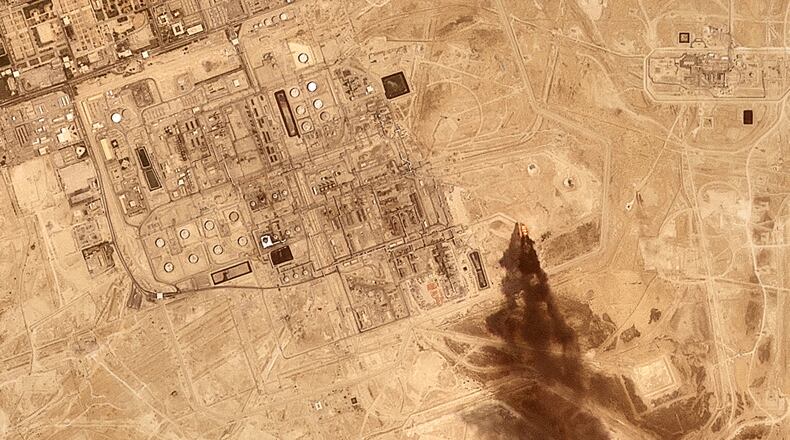 This satellite image provided by Planet Labs PBC on July 27, 2026 shows smoke rising from the Saudi Aramco oil processing facility in Abqaiq, Saudi Arabia, 2026. (Planet Labs PBC via AP)