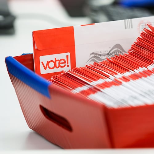 FILE - A tray of mail-in ballots is seen at King County Elections headquarters on Election Day, Nov. 5, 2024, in Renton, Wash. (AP Photo/Lindsey Wasson, File)
