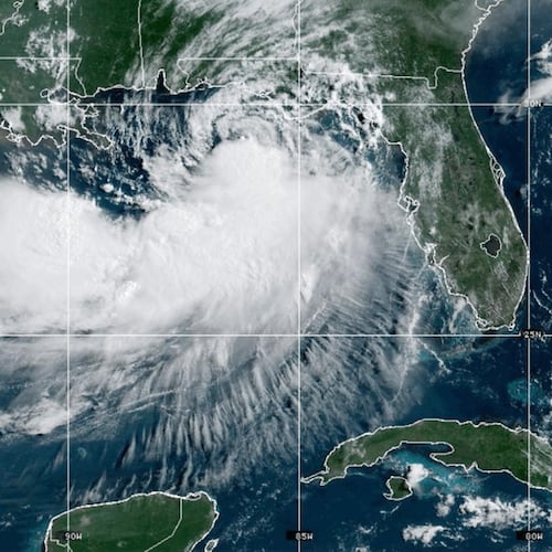 This NOAA satellite image taken at 10:30 a.m. EST on Tuesday, July 21, 2026, shows Tropical Storm Bertha moving along the Gulf of Mexico's northern coast. (NOAA via AP)
