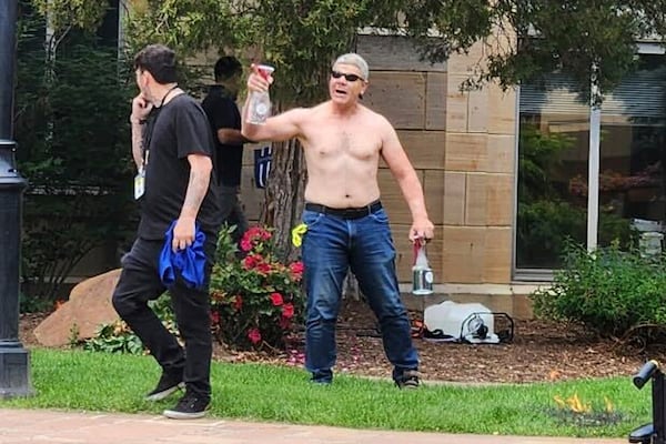 In this June 1, 2025 photo provided by Lisa Turnquist, Boulder, Colorado attack suspect Mohamed Sabry Soliman is seen as he launched a fiery attack on demonstrators at an outdoor mall, Sunday, June 1, 2025, in Boulder, Colo. (Lisa Turnquist via AP)