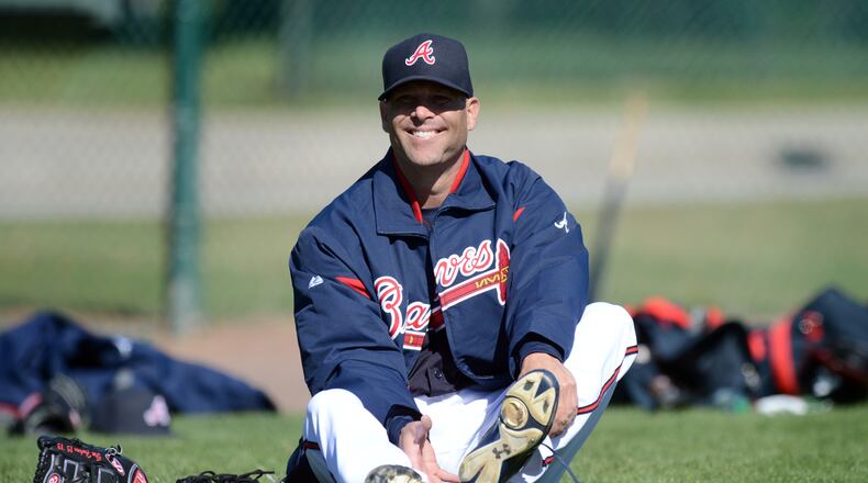 February 17, 2013 Lake Buena Vista, Fl: Atlanta Braves pitcher Tim Hudson takes his shoe off after his pitching practice during the third full squad workout at Champion Stadium in the ESPN Wide World of Sports Complex in Lake Buena Vista, Fl., on Sunday, Feb. 17, 2013. HYOSUB SHIN / HSHIN@AJC.COM