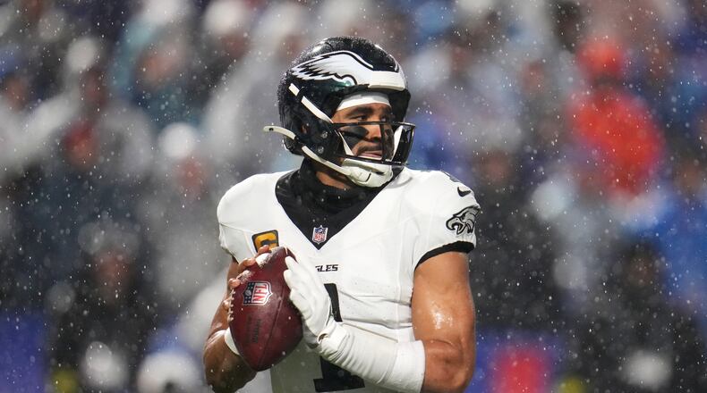 Philadelphia Eagles' Jalen Hurts passes during the second half of an NFL football game against the Buffalo Bills, Sunday, Dec. 28, 2025, in Buffalo, N.Y. (AP Photo/Gene J. Puskar)